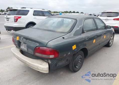 1998 Mazda 626 Dx/Lx z USA, uszkodzony, nr VIN 1YVGF22C3W5772322
